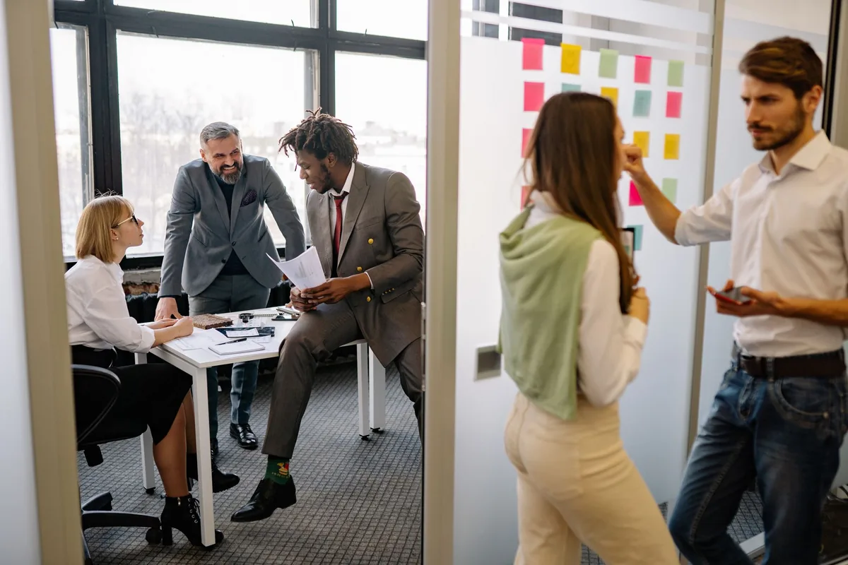 Coaching team mapping the business systems for coaches before scaling