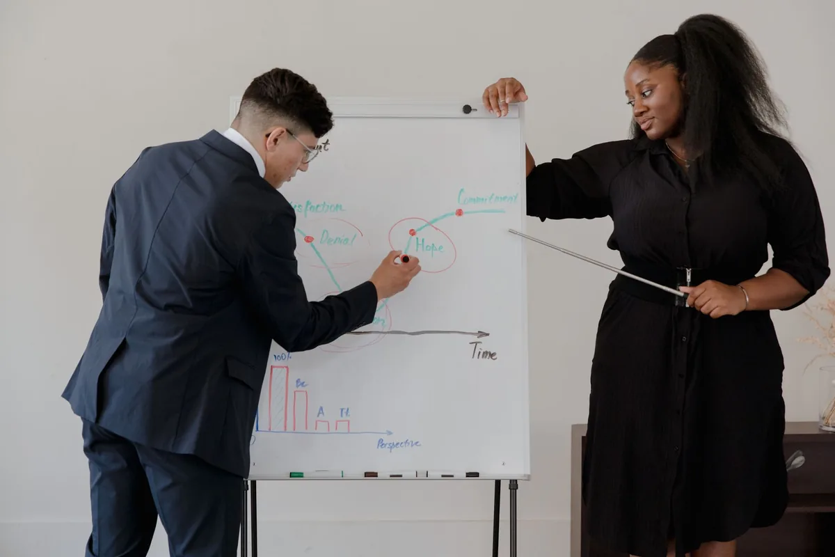 A new business coach mentoring a client, learning how to become a business coach